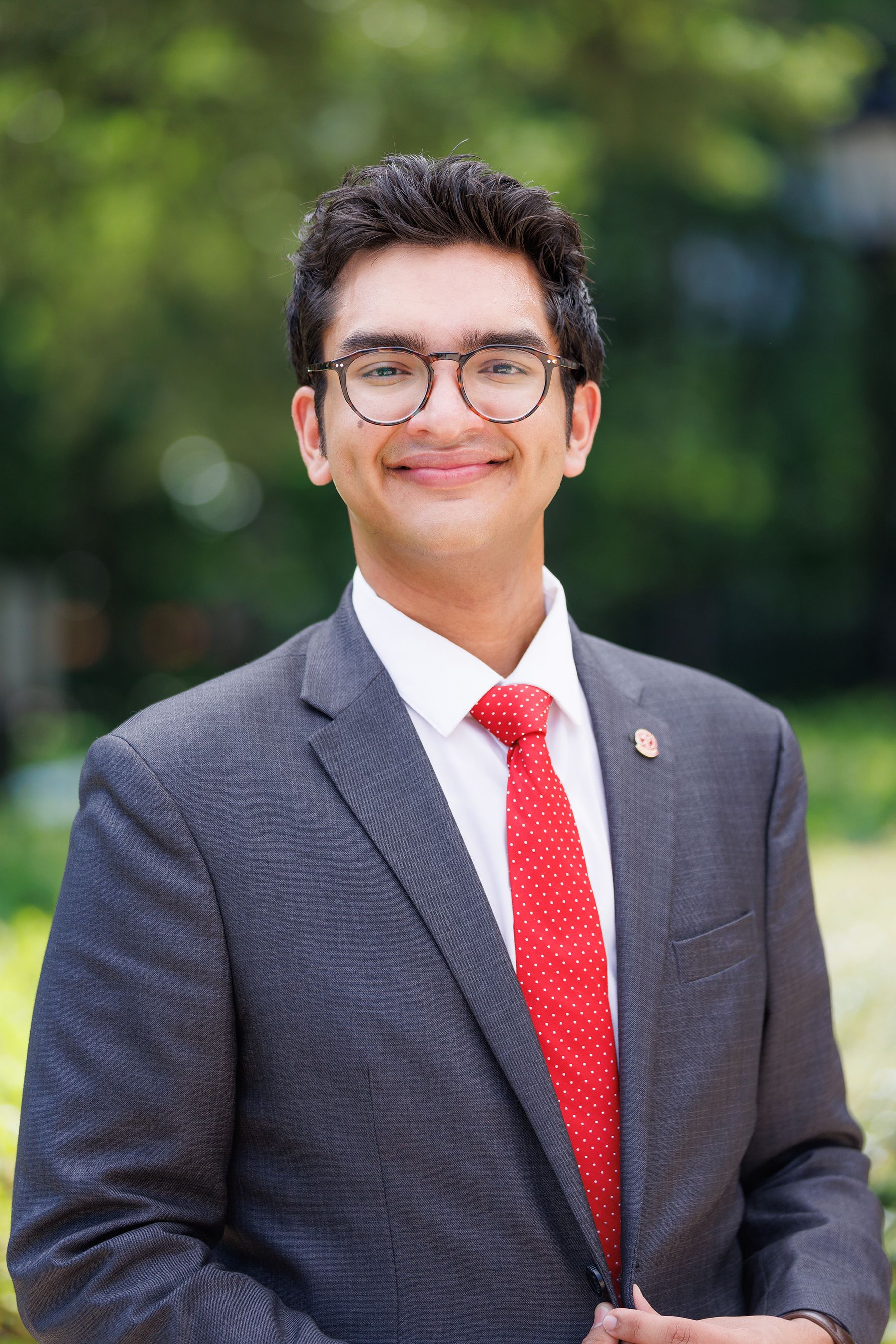 Samad smiles into the camera 