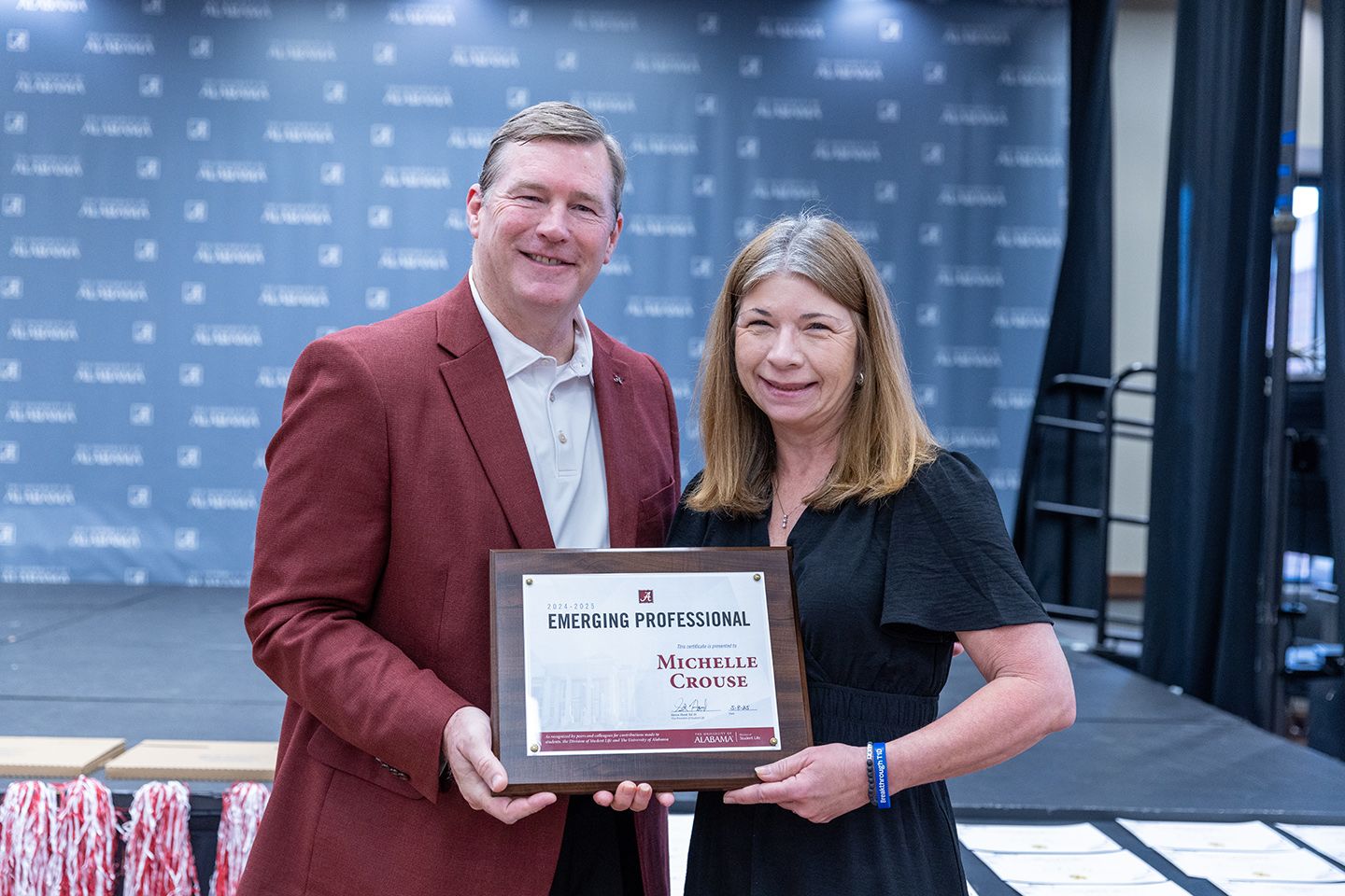 Michelle accepting award with Dr. Hood