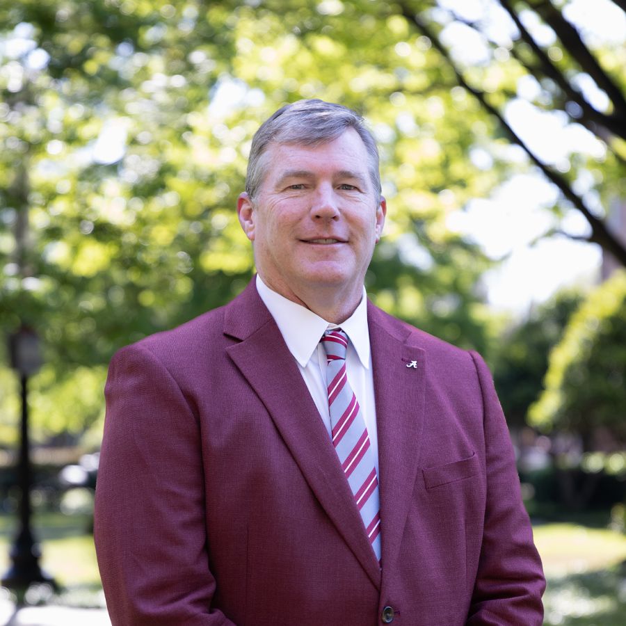 Dr. Hood smiles into the camera