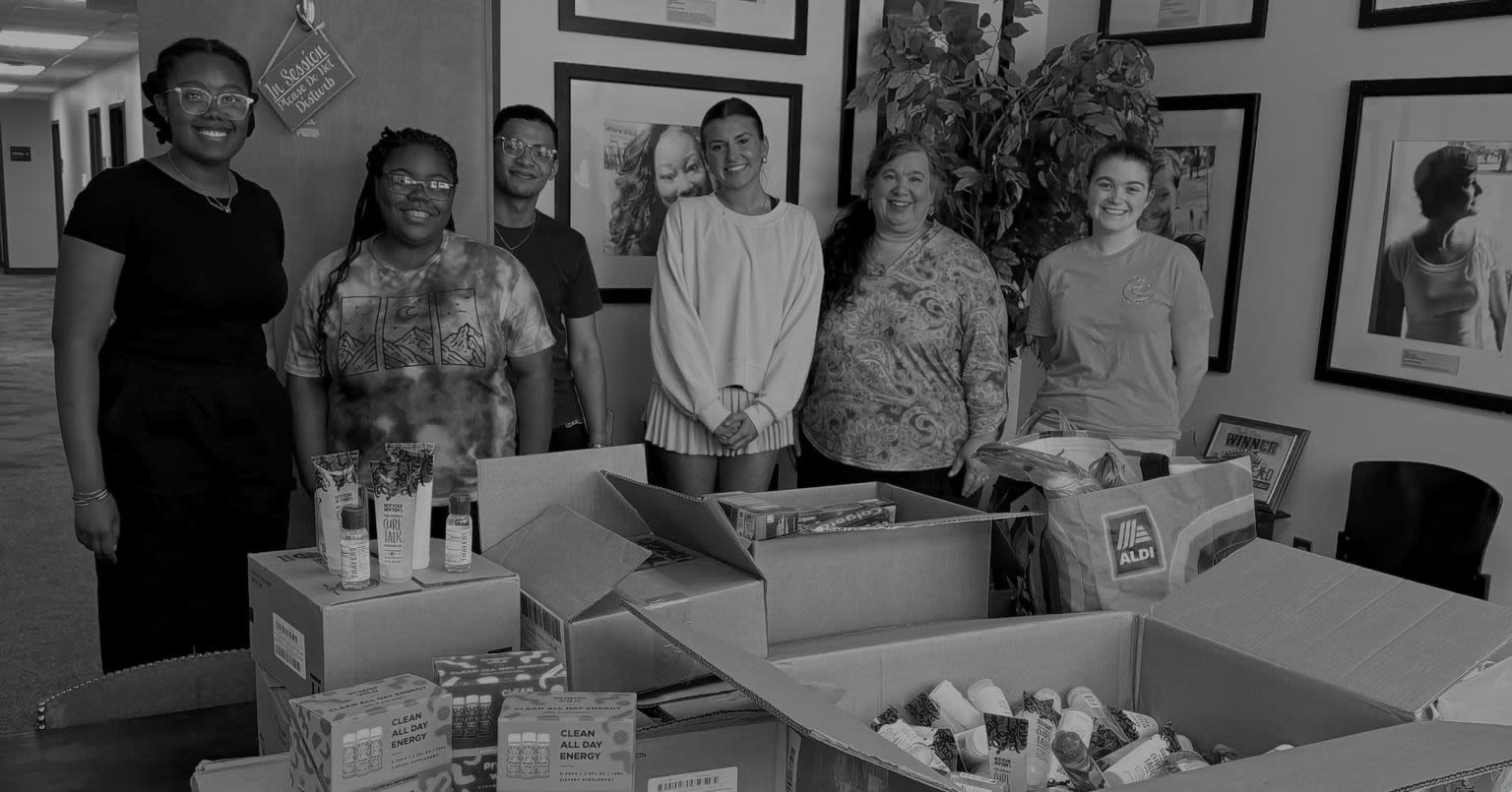 group of individuals box things