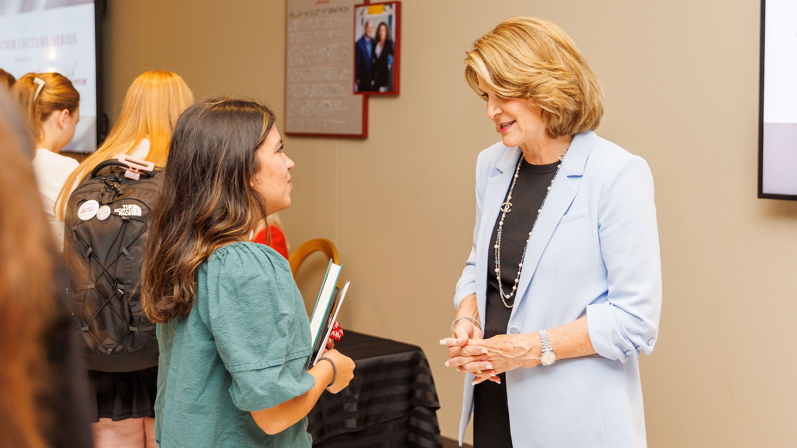 Marillyn Hewson speaks to a student