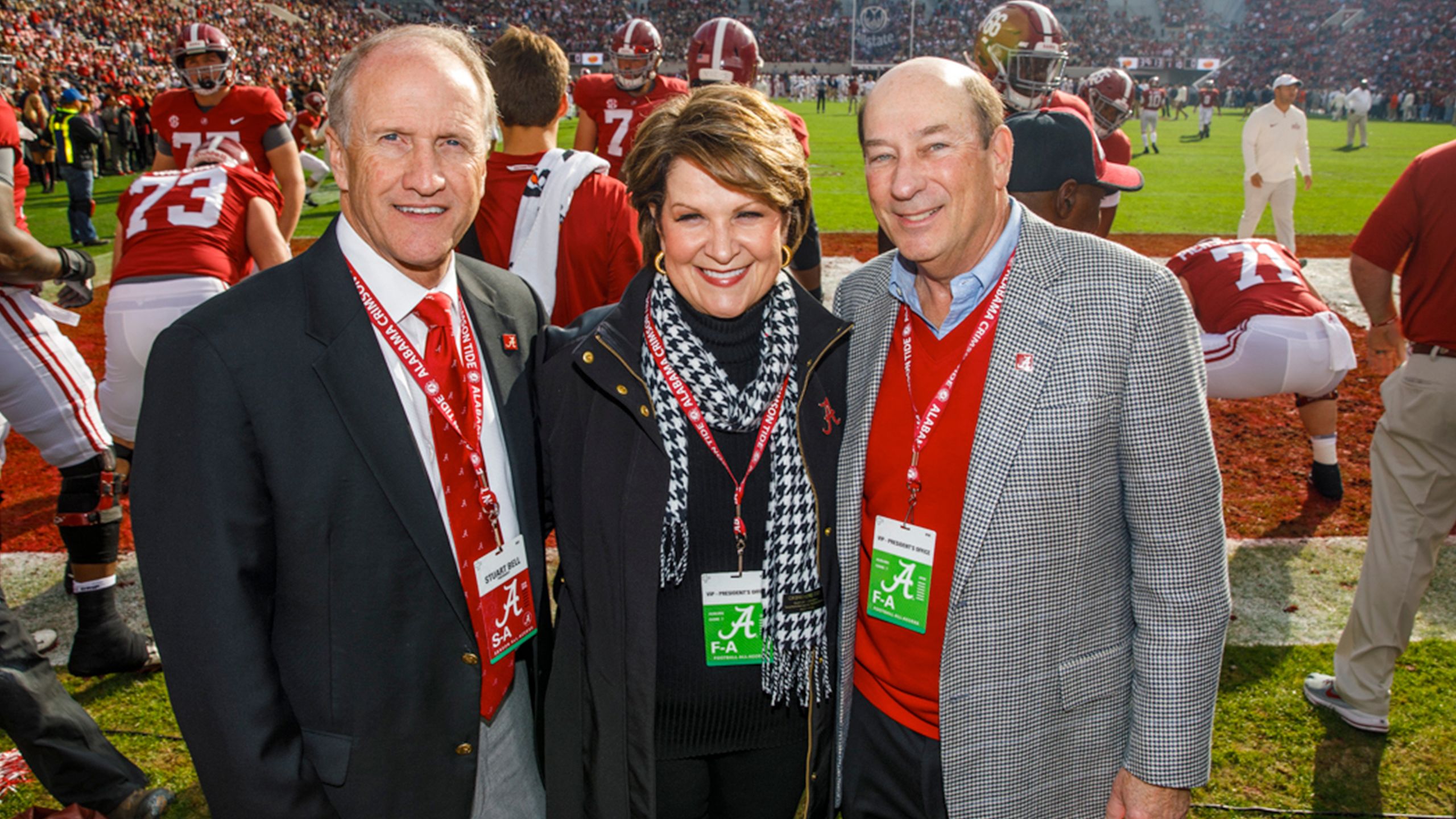The Hewsons pose with Dr. Bell
