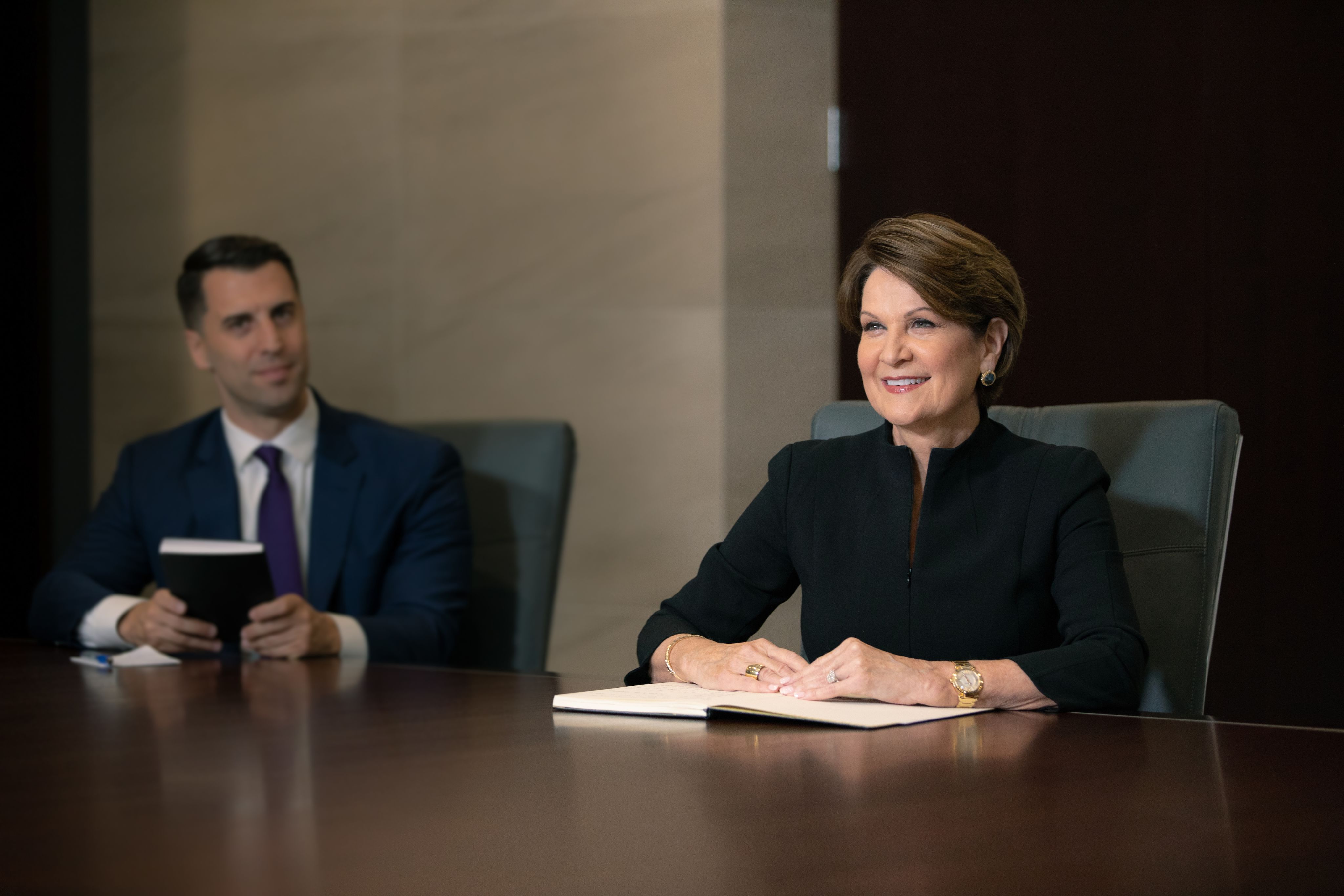 Marillyn Hewson sitting at a conference table