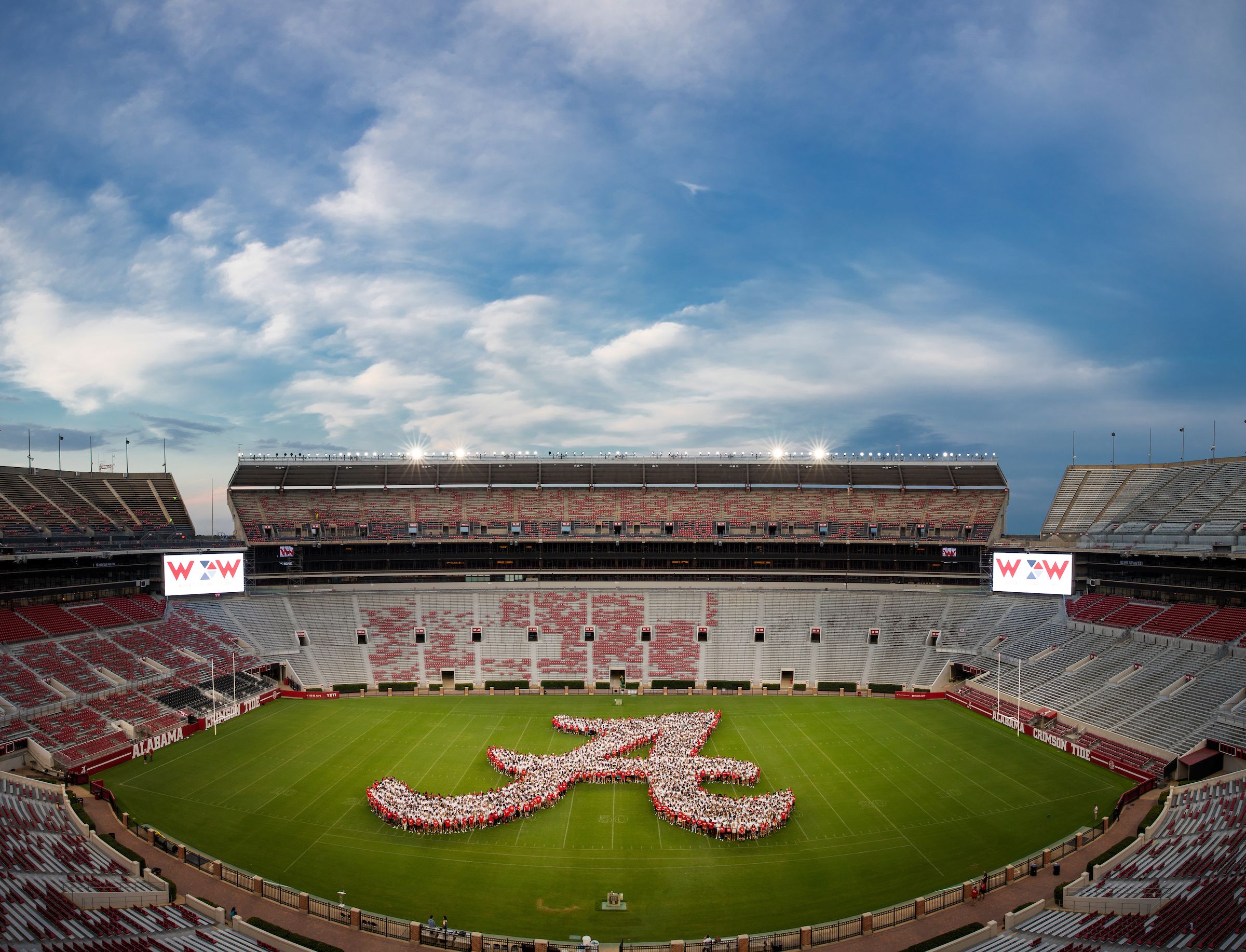 UA students forming a script A in the middle of Bryant Denny Stadium