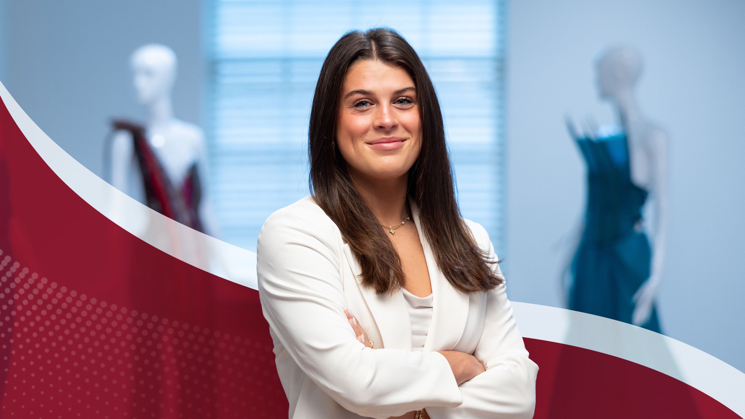 Laken Thompson posing with some of her fashion designs.