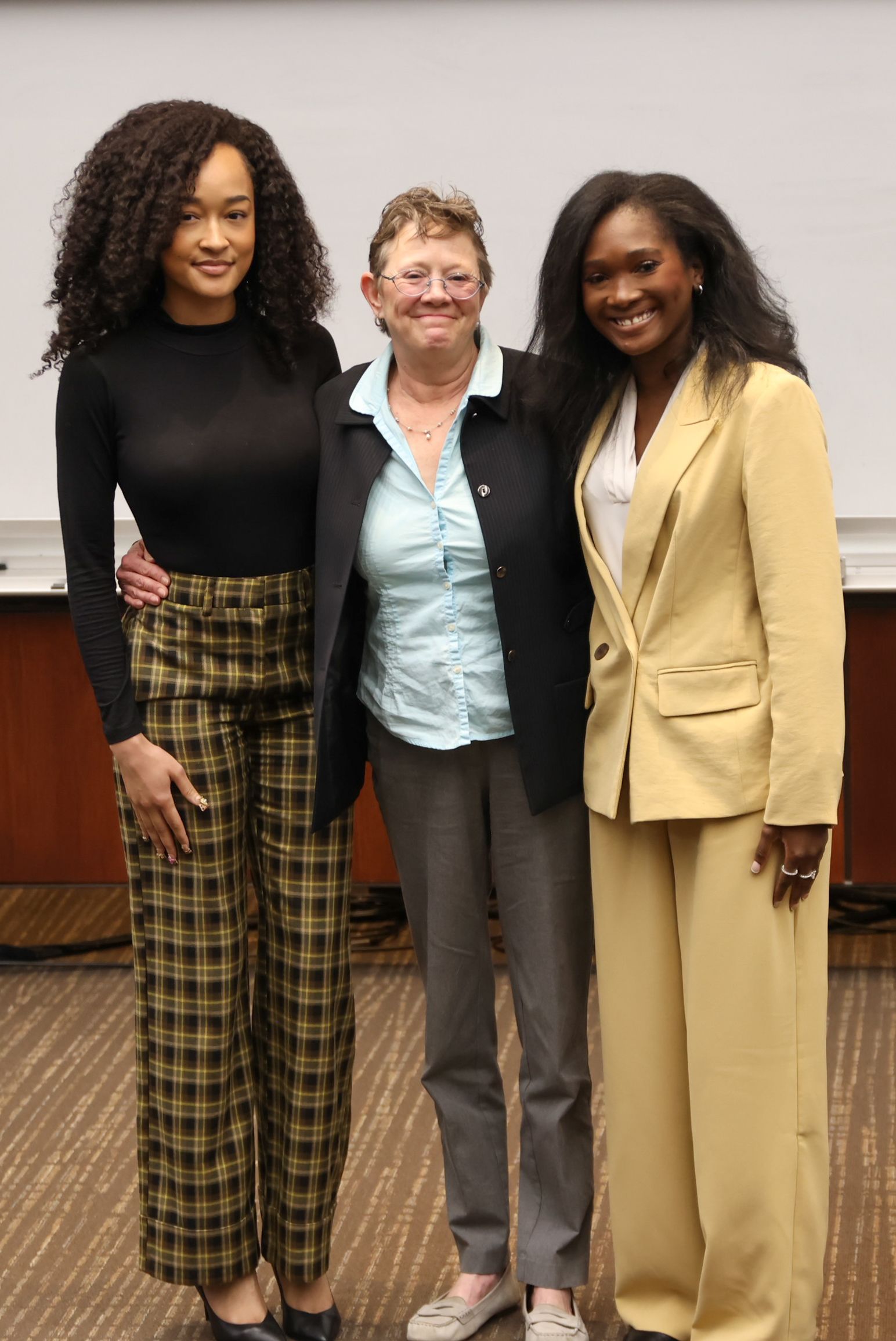 Group photo of three women 