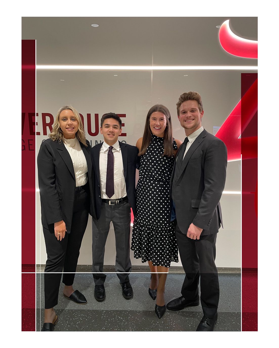 Nathan and classmates stand together in Hewson Hall