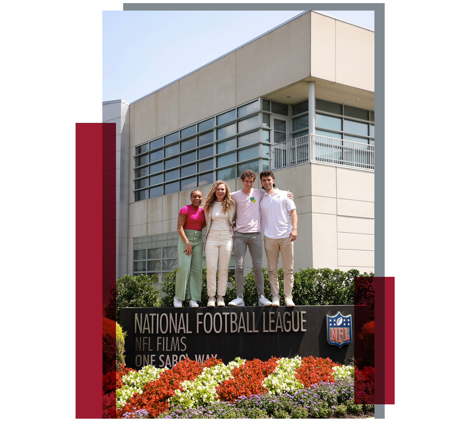 Emily and teammates standing on the NFL Films headquarters entrance sign.