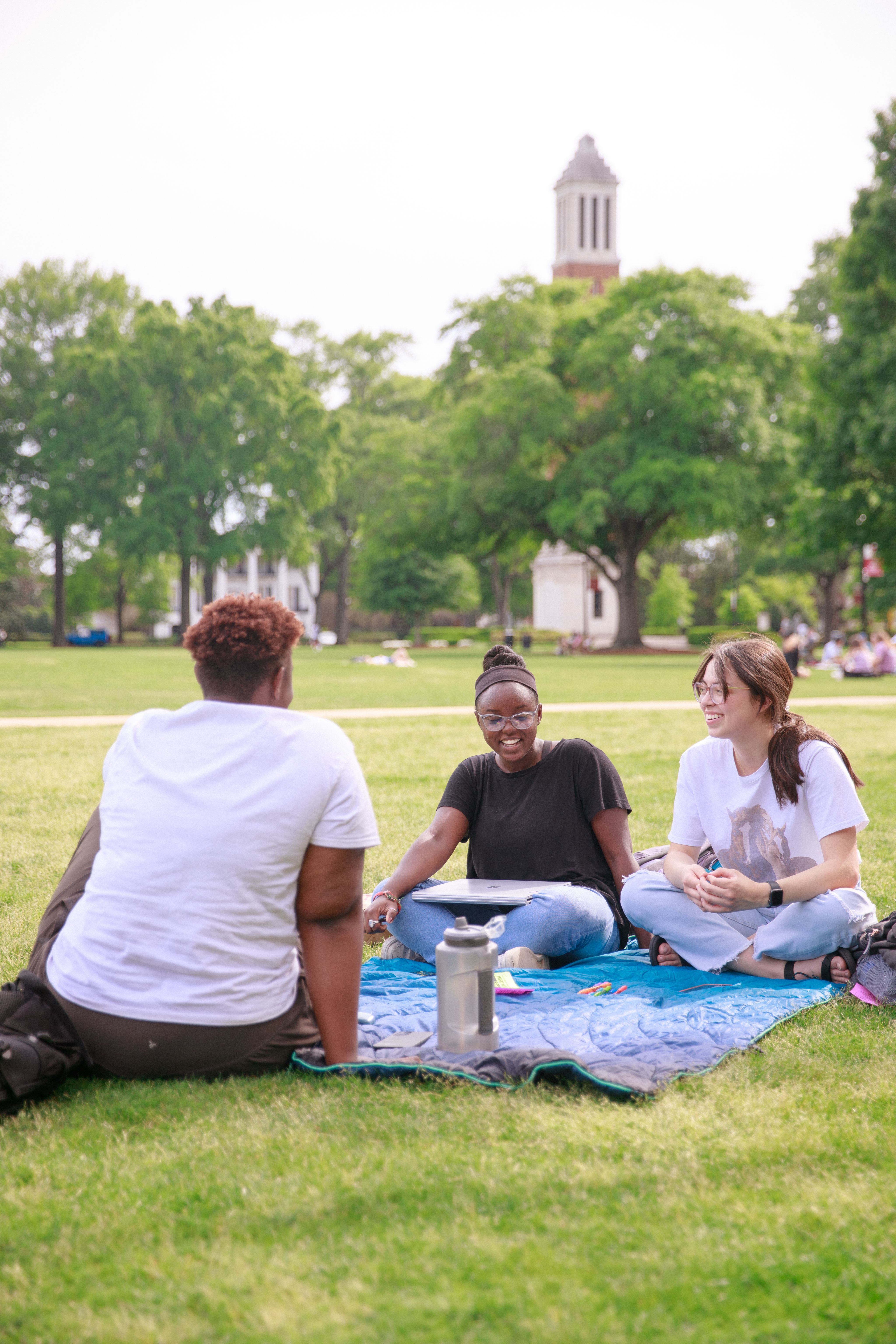 Students sitting on the Quad 