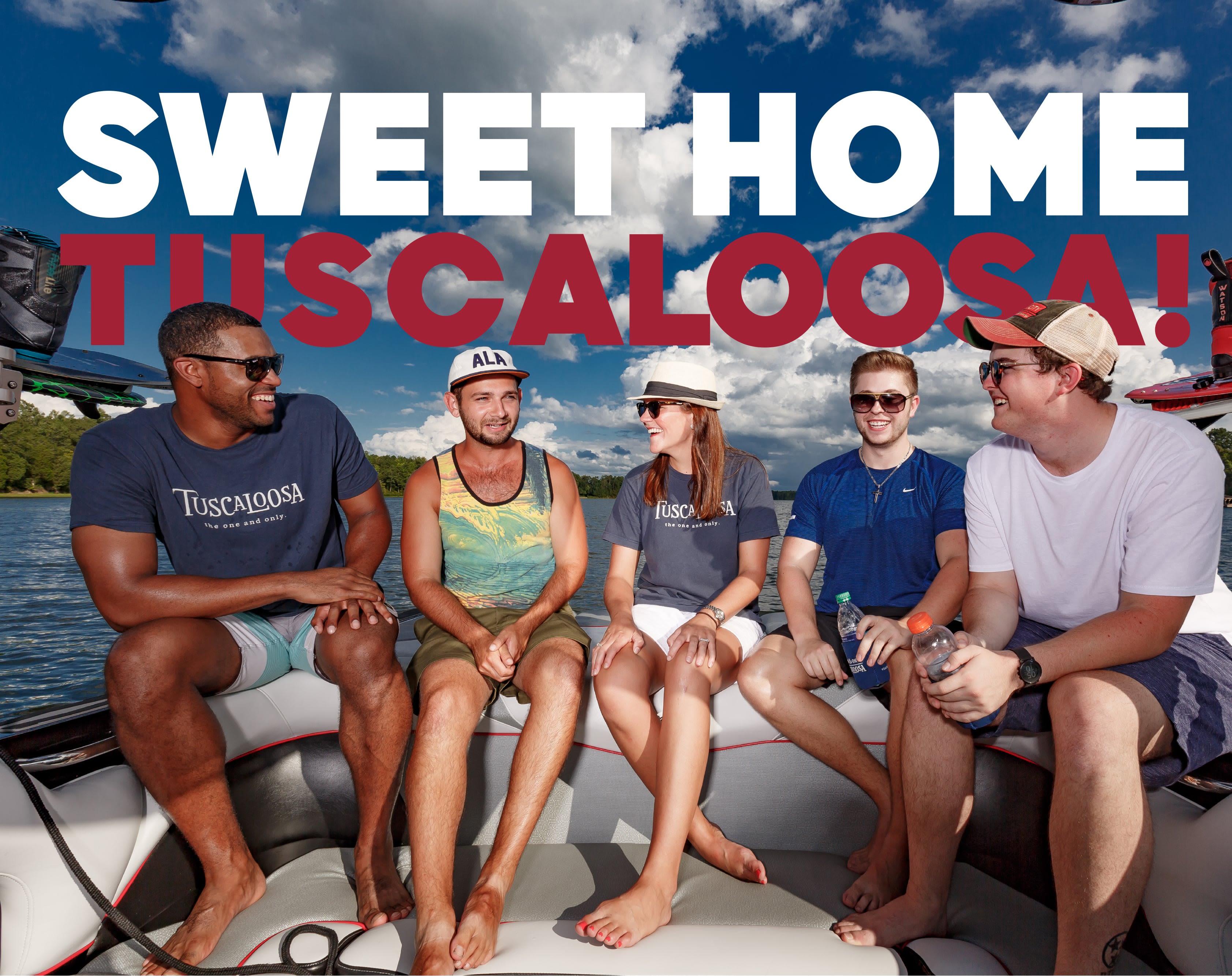 Sweet home tuscaloosa. A group of students sit together on a boat in lake tuscaloosa