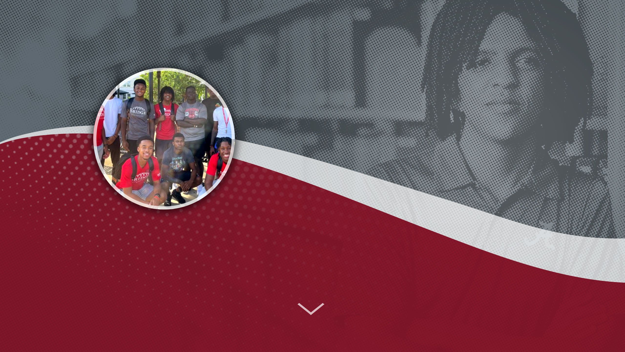 Yonathan Janka poses with a group of BRIDGE students