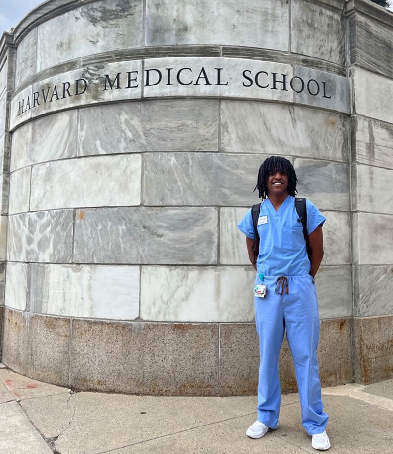 Yonathan Janka standing outside of Harvard Medical School