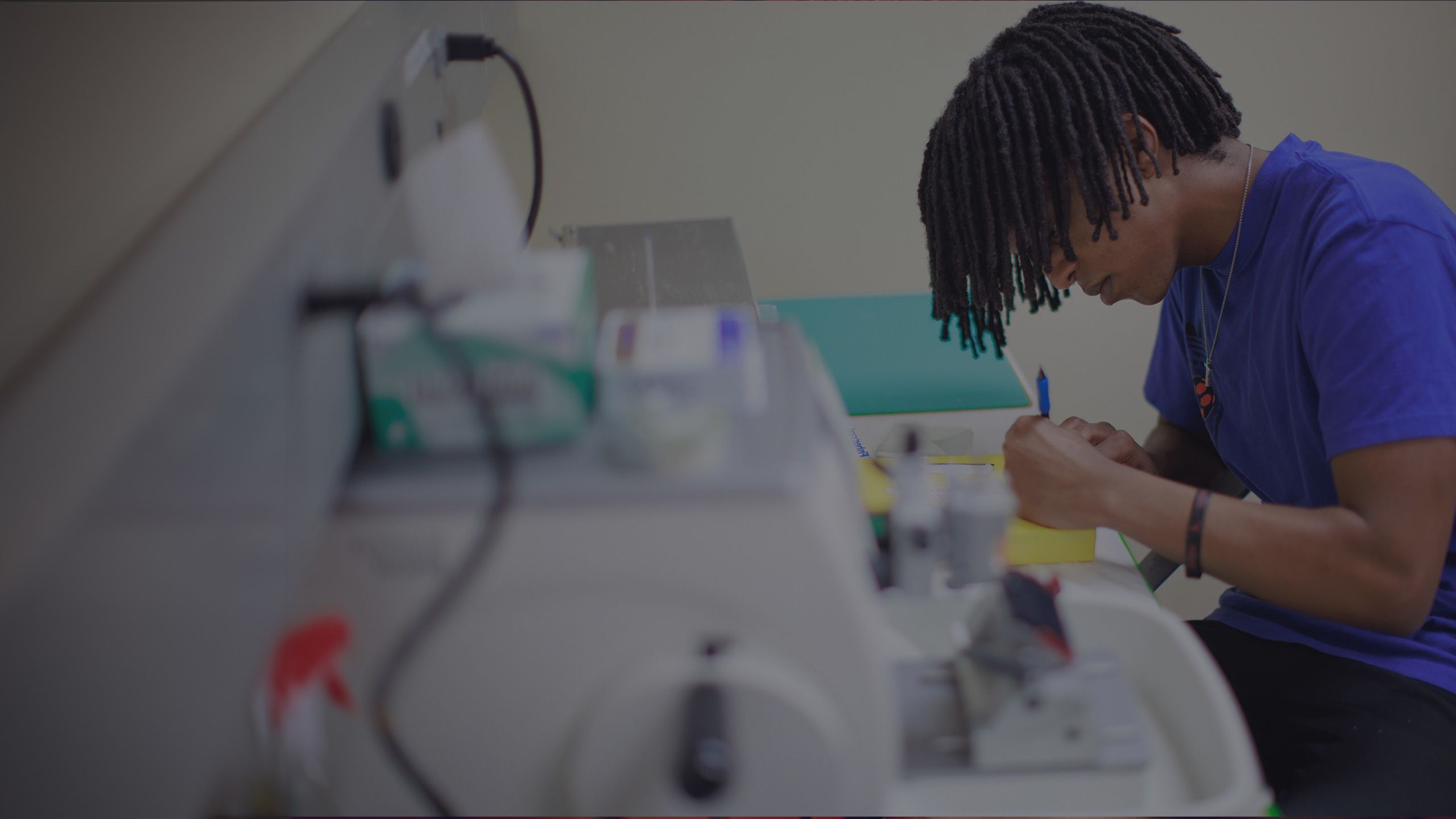 Yonathan Janka working dilligently in a research lab.