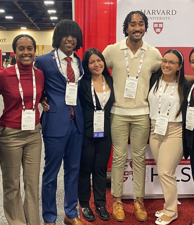 Yonathan Janka poses with a group of peers at Harvard Medical School