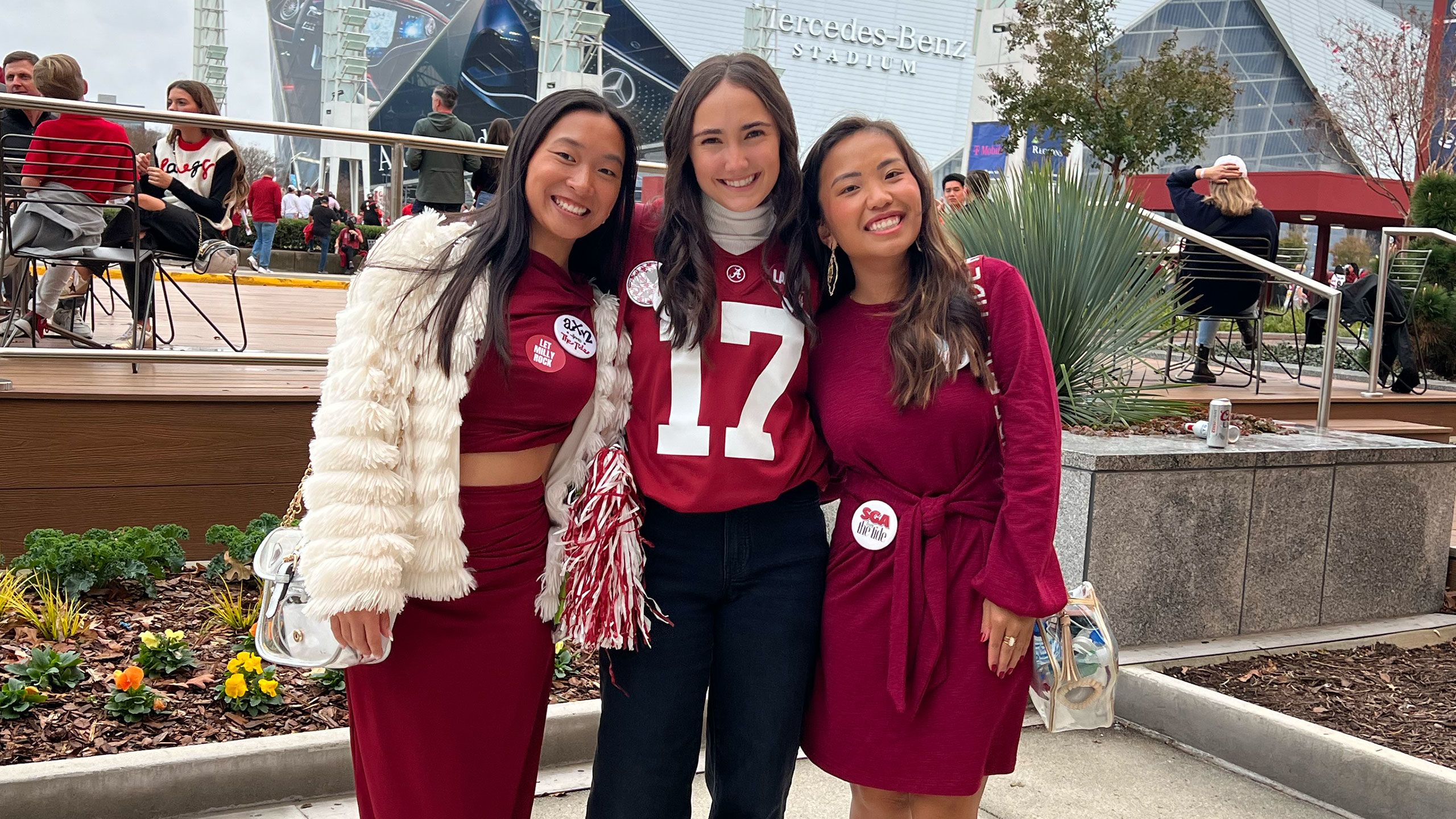 Brittany Grigorian poses with two friends outside of the SEC Championship Football game.