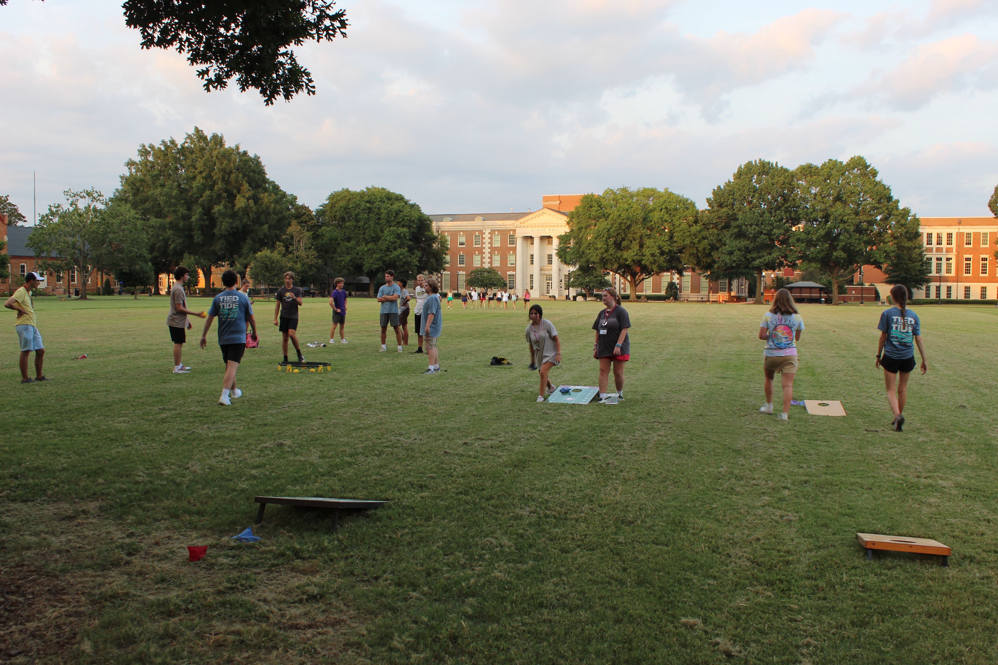 Honors students play corn hole on the Quad.