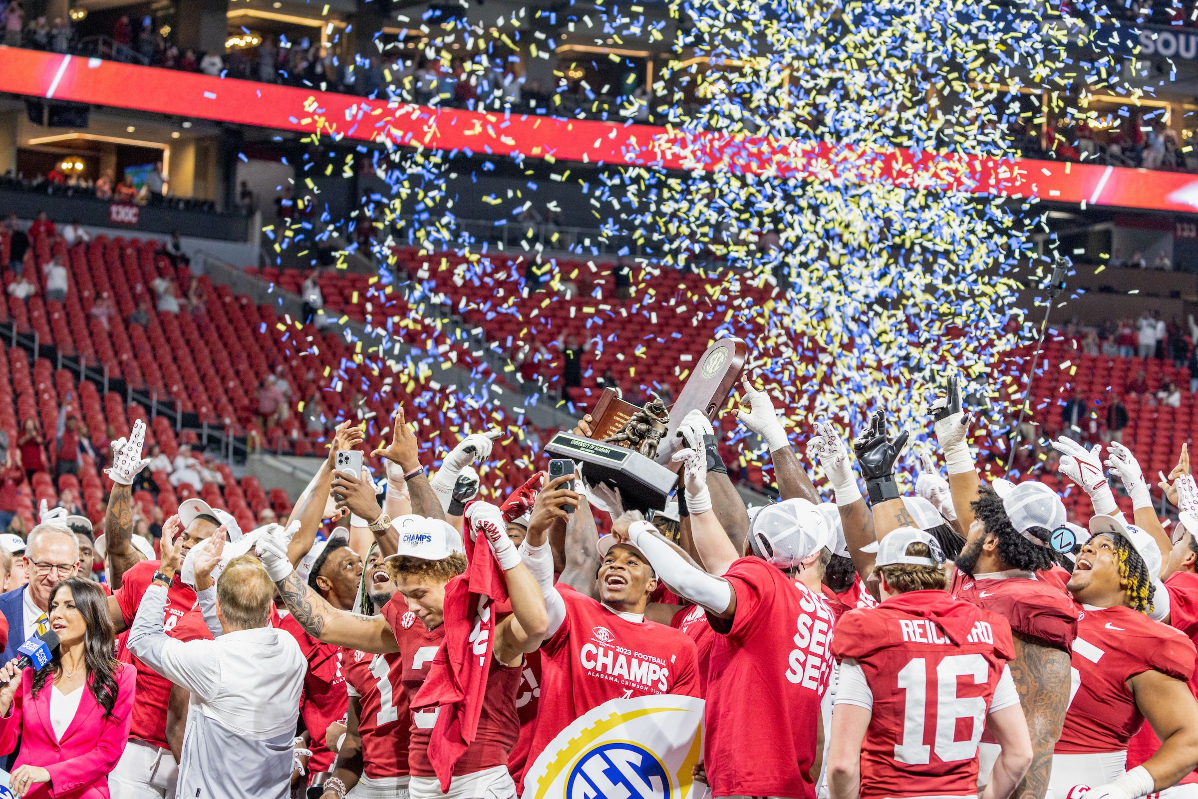 Crimson Tide football players celebrate SEC championship.