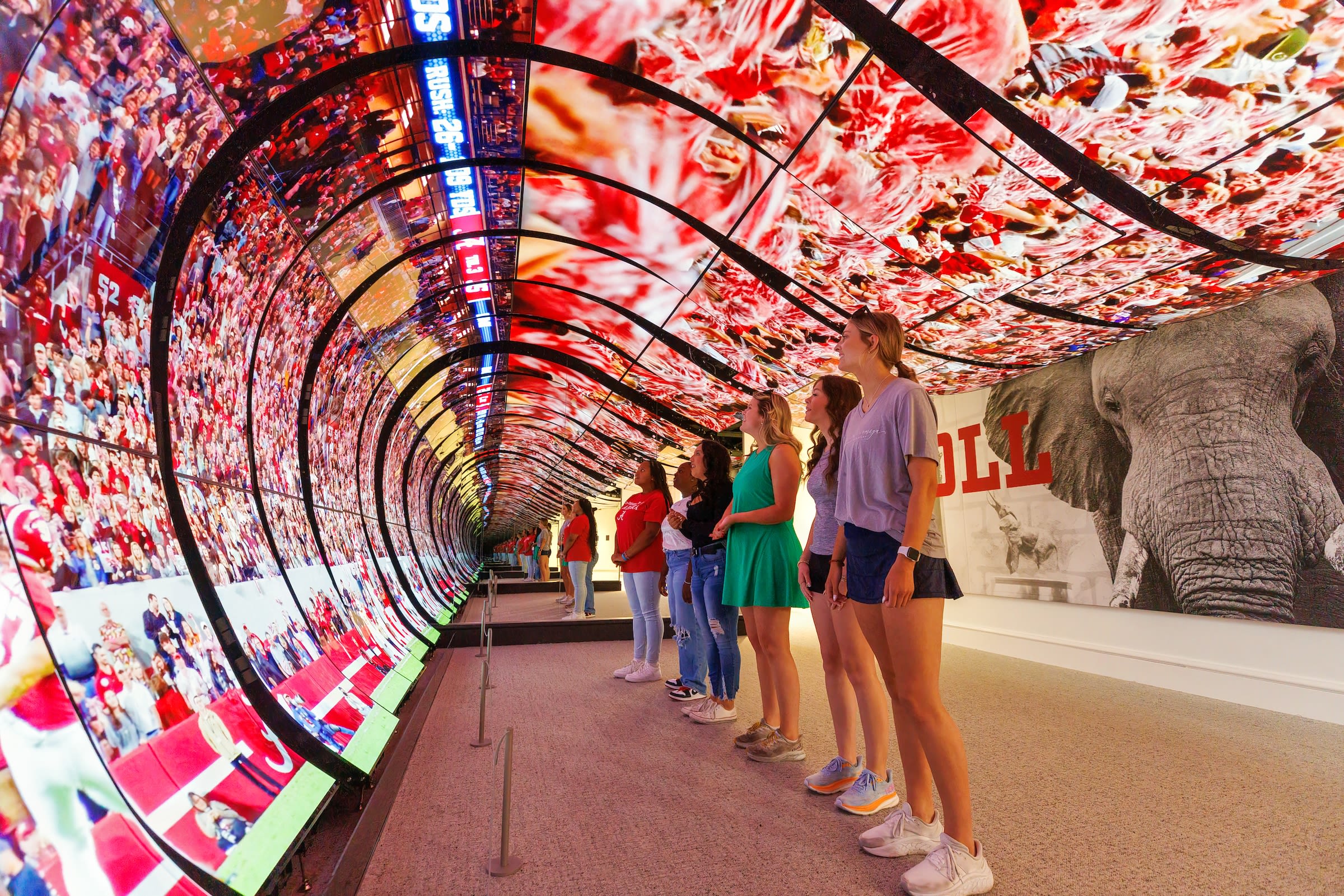 Students in the immersive experience of the Randall Welcome Center.